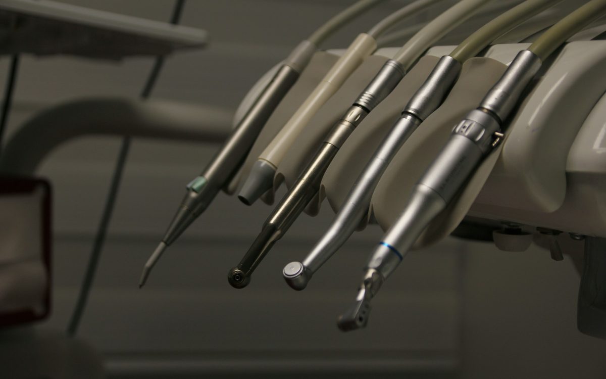 A row of sterilised dental instruments ready for use